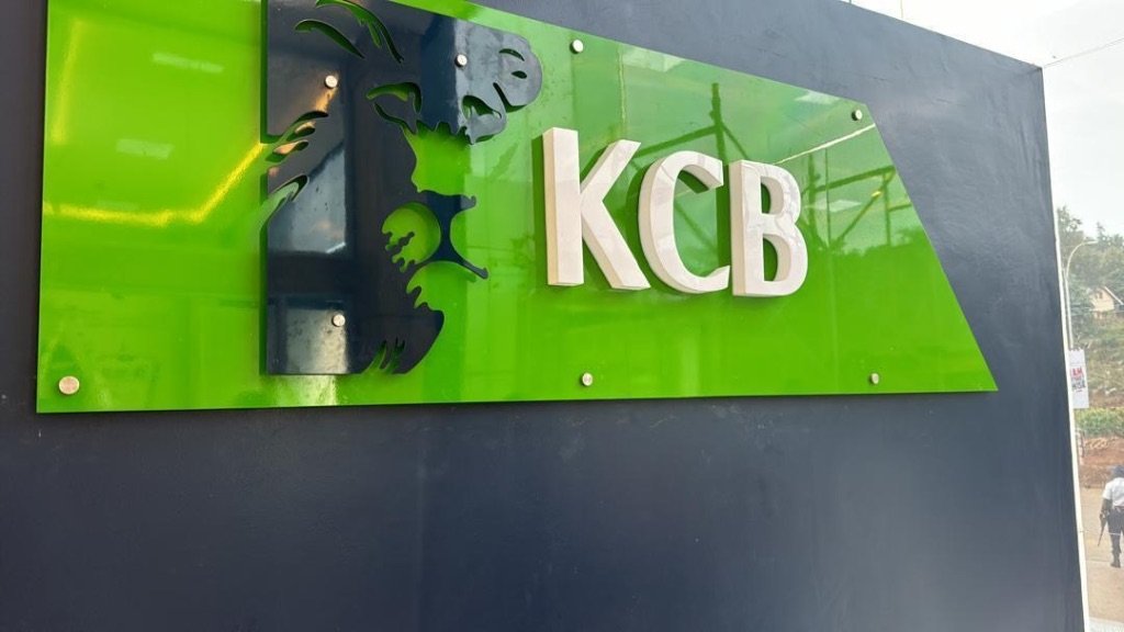KCB Bank signage, lion logo on green acrylic panel